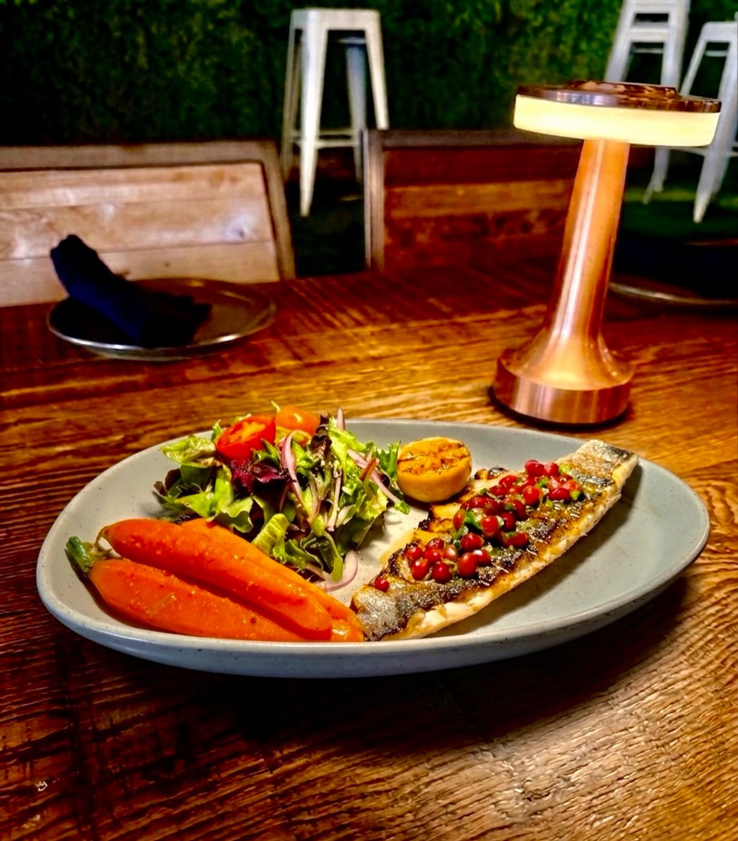 Grilled branzino with vegetables at Eden Gastrobar