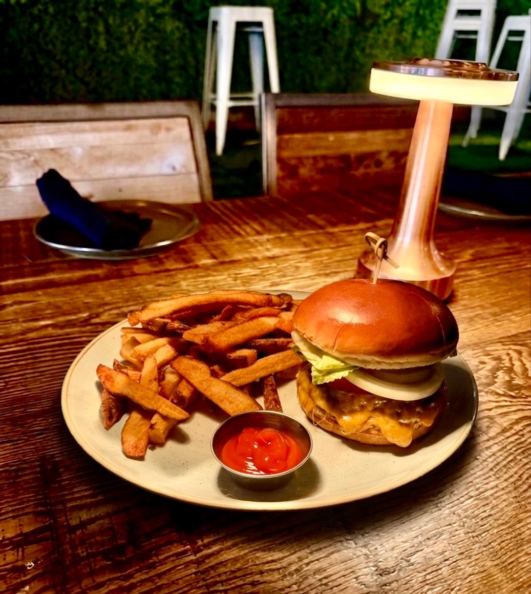 Eden burger with yellow cheddar, brioche, and house-cut fries